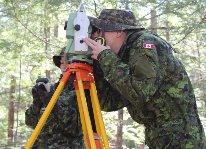 Civil Engineering Students using survey equipment